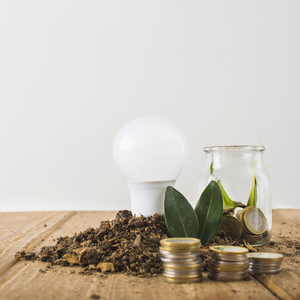 Sto-Italia-light-bulb-with-glass-jar-coins-stacks
